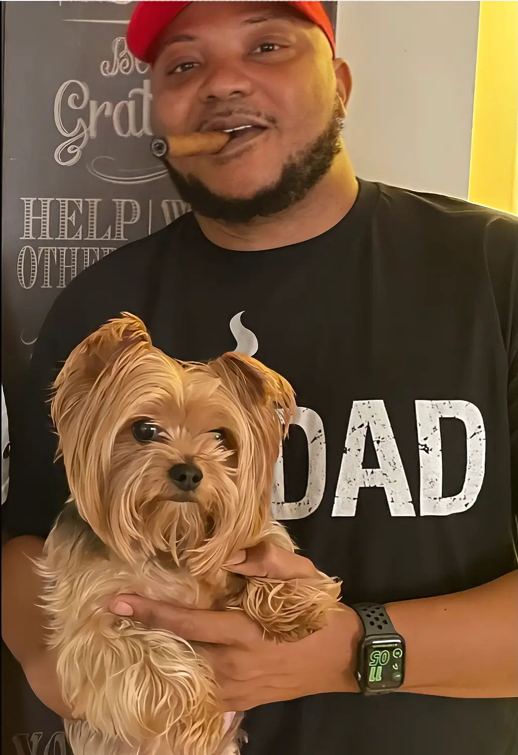 Robert Williams, founder of Day1Father, with his dog Alvin